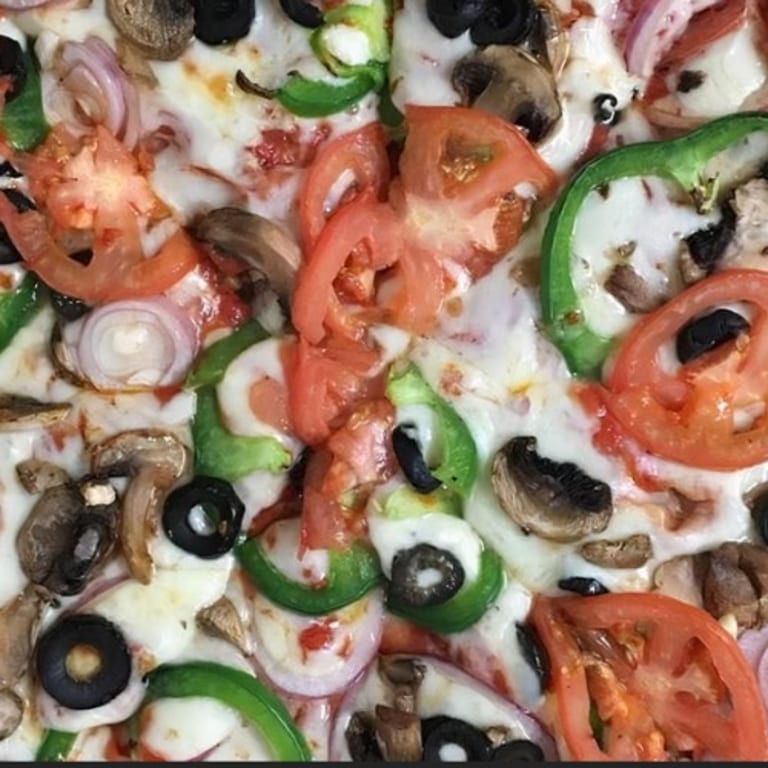 Savor Our Veggie Pizza